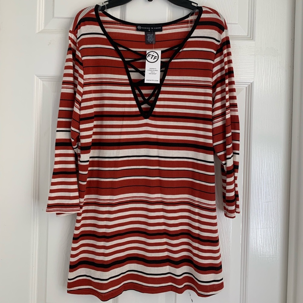 Orange and white striped knit top
